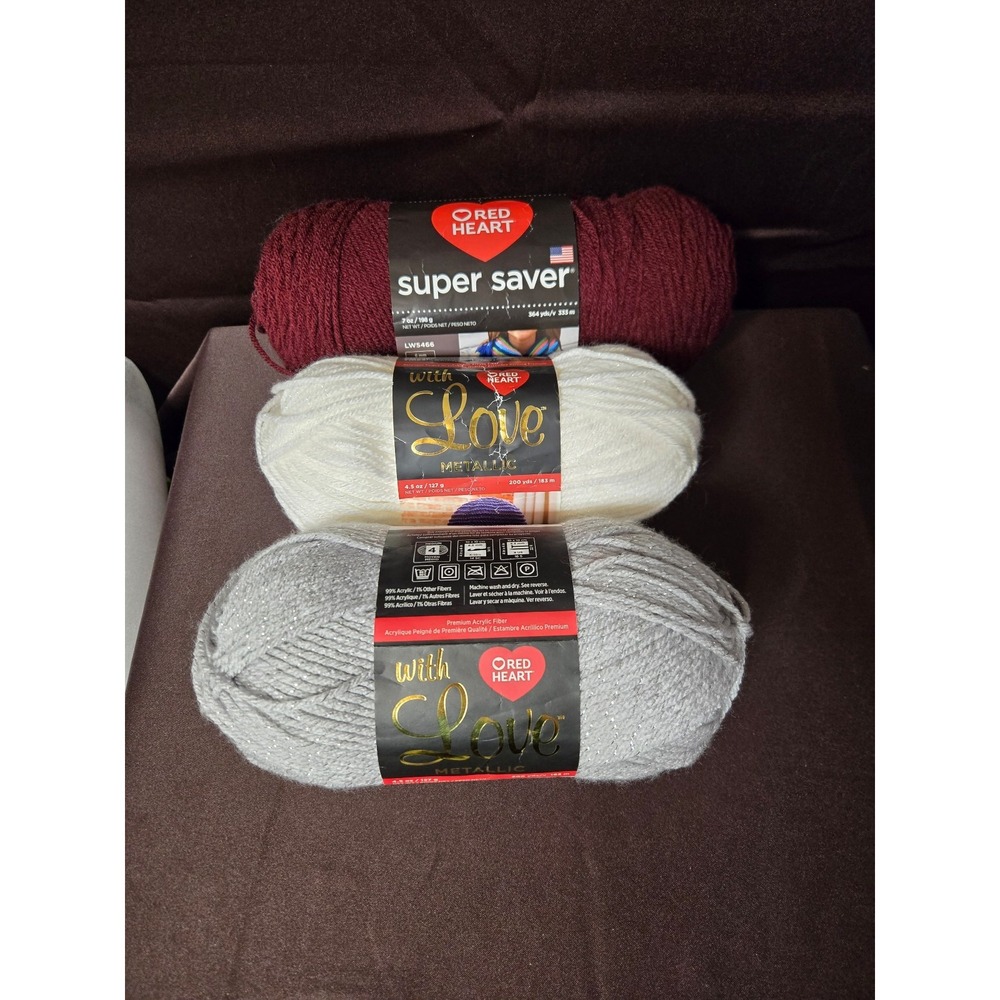 Red Heart Yarn, 2 Metallic and 1 Super Saver.